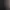 Façade d'un bâtiment historique avec des fenêtres à vitraux et des sculptures ornées